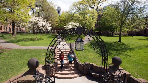A pair of students walk on Rutgers–New Brunswick's Old Queens