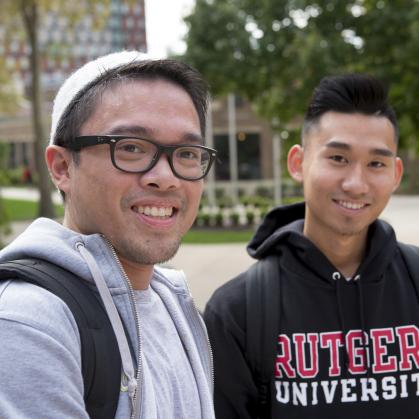 Two male students smiling